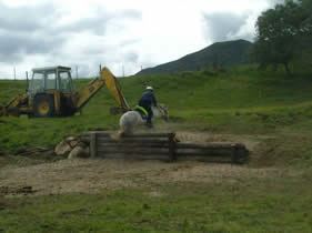 Lorna jumping up a step the same height as her pony!